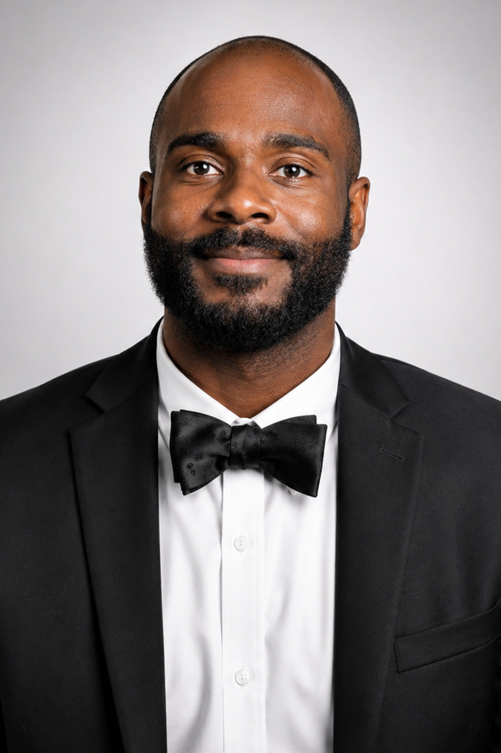 Professional man in a black tuxedo and bow tie